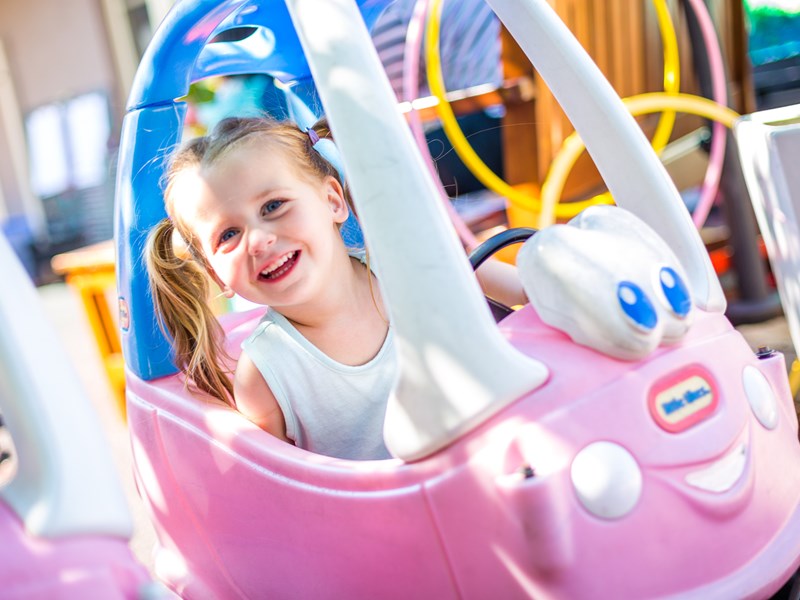 ShellyTots playground - girl smiling and happy
